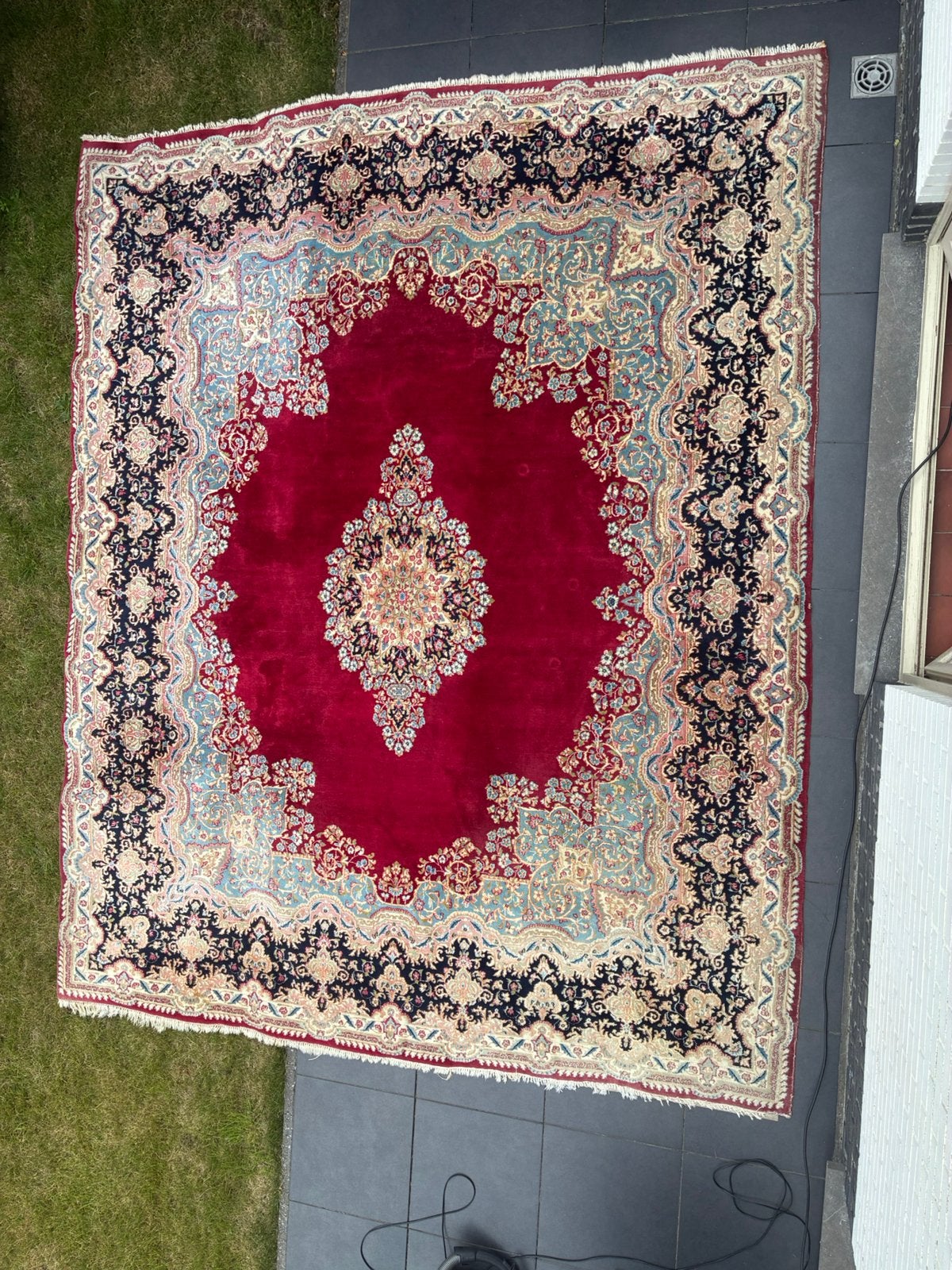 Perzisch vintage tapijt, Ophalen