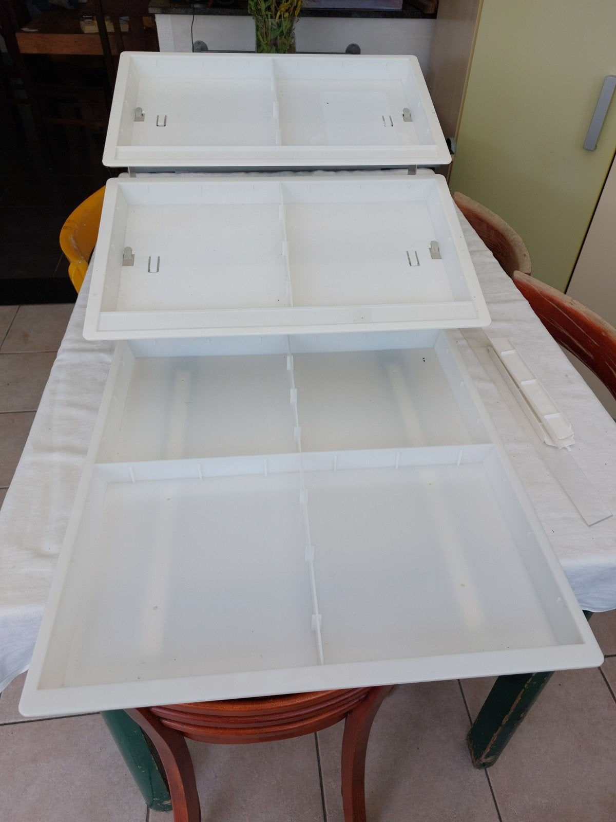 witte kunsstof opbergmeubel, Enlèvement