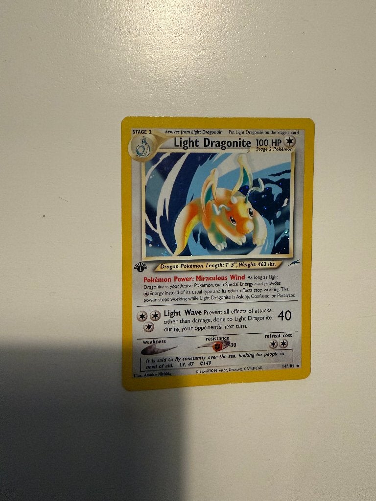 light dragonite first edition, Ophalen of Verzenden, Zo goed als nieuw, Losse kaart, Foil