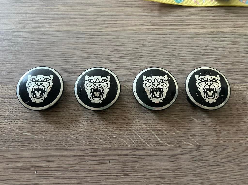 Jaguar 4 originele wieldopjes, Ophalen of Verzenden, Zo goed als nieuw