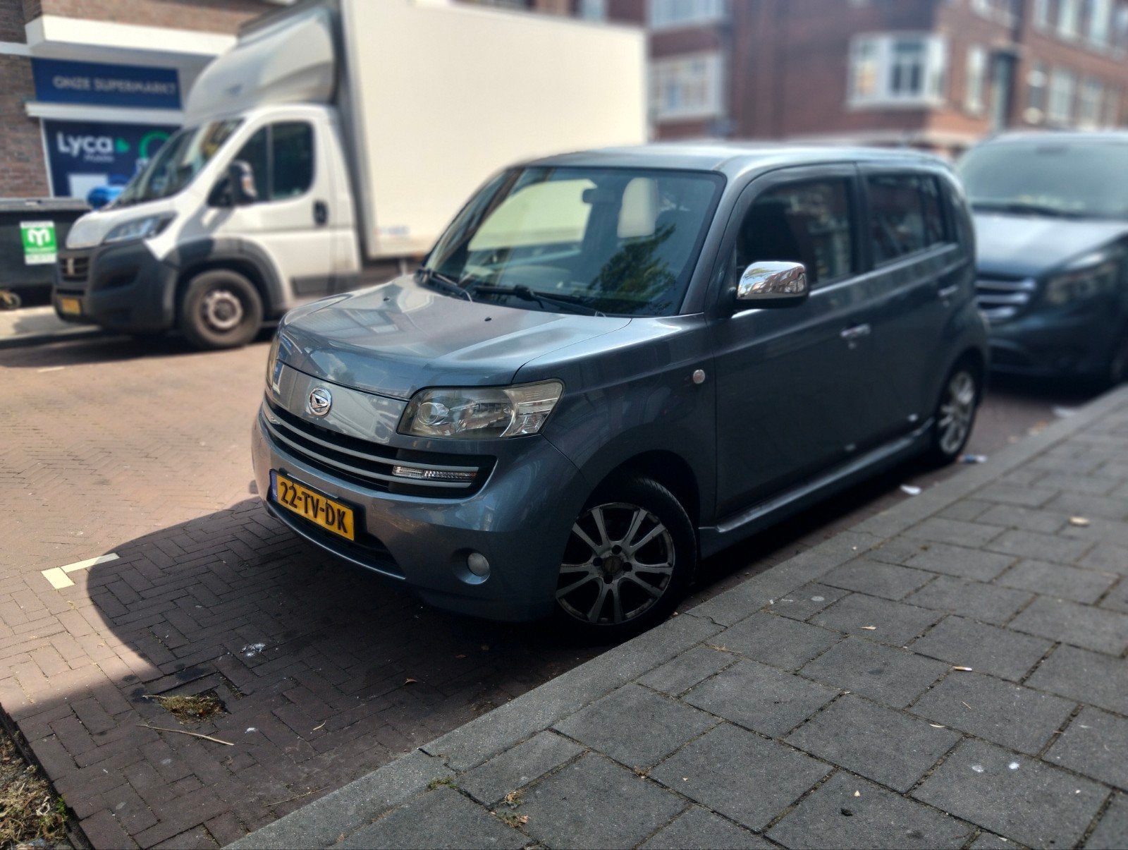 Daihatsu Materia 1.3 2007 Grijs, Auto's, Daihatsu, Trekhaak, Grijs, 1000 kg, Euro 4