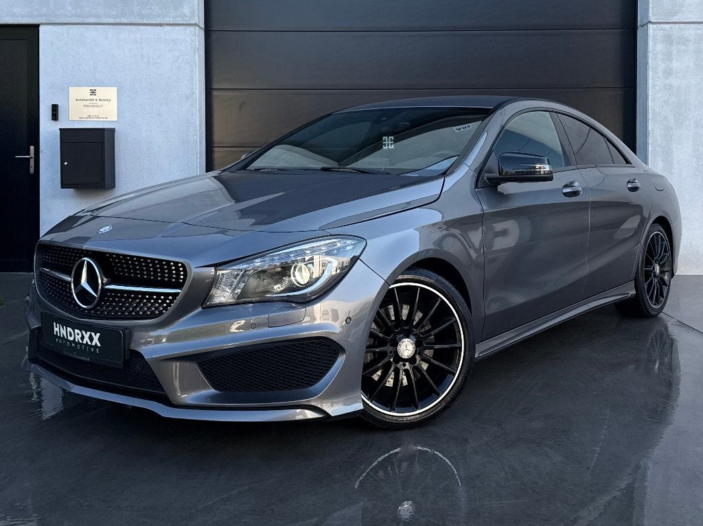 Mercedes CLA 250 4MATIC AMG Line | Leder | H&K | Camera, Auto's, Automaat, CLA, 4 cilinders, Zwart