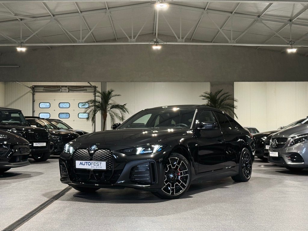 la BMW i4 eDrive40 M-Sport PRO - Garantie, Autos, BMW, Entreprise, Entretenue par le concessionnaire, Noir, 5 portes
