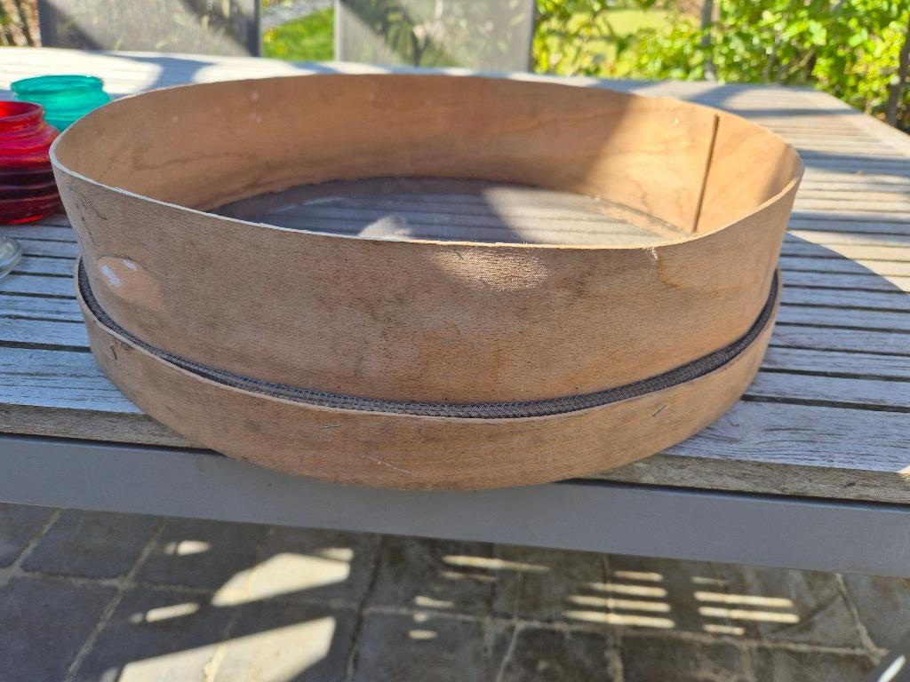 houten zeef, Ophalen