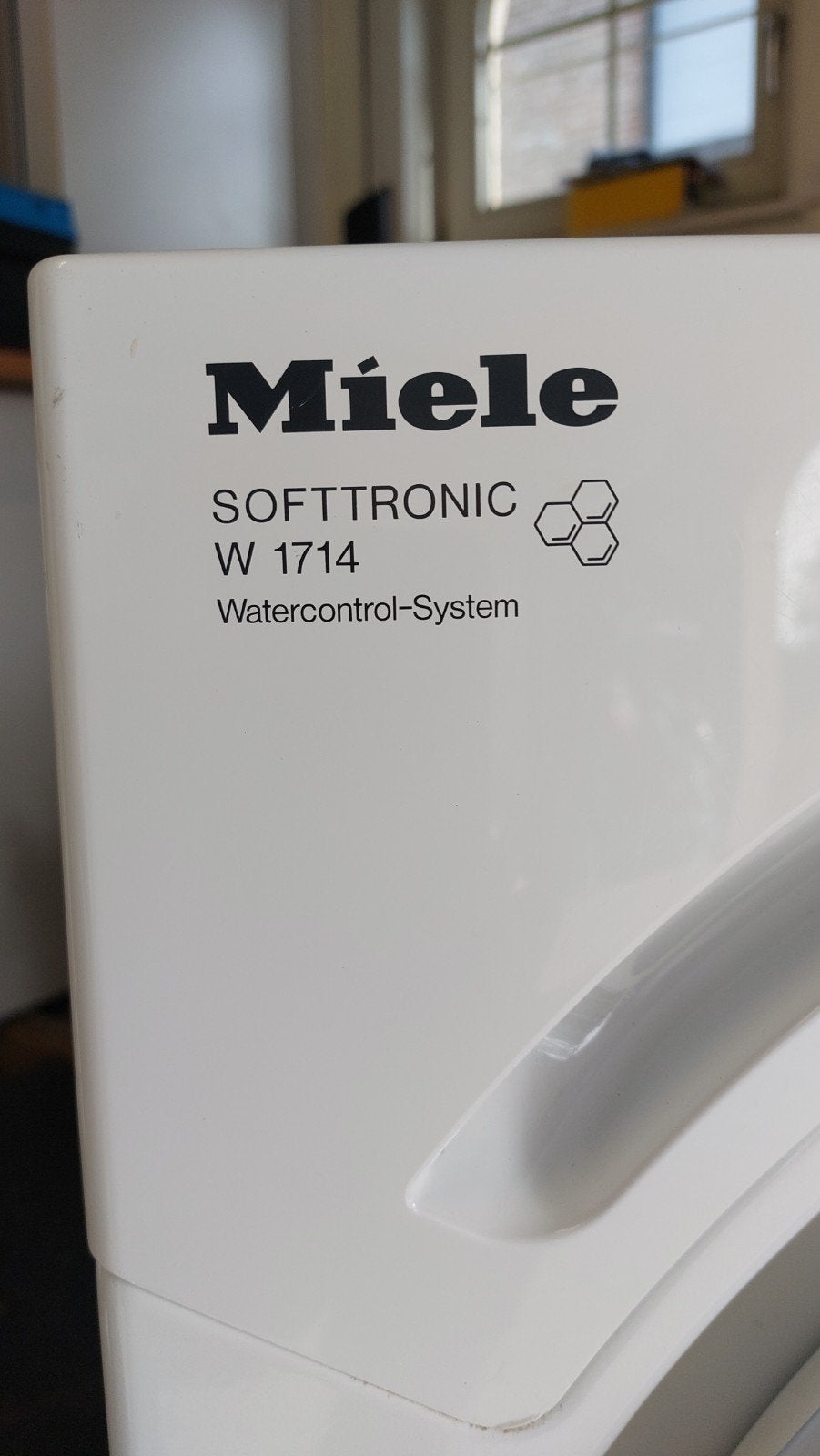 wasmachine Miele, Ophalen