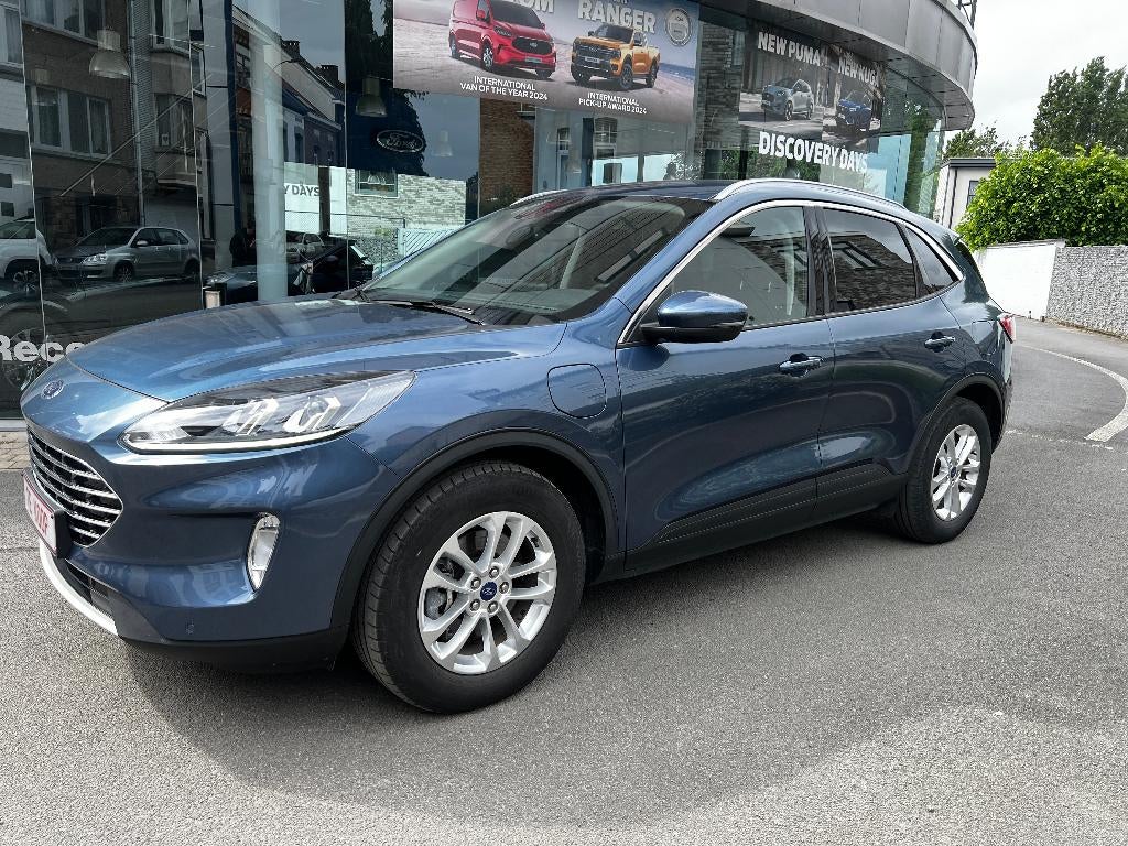 Ford Kuga Plug-in Hybride PHEV 2.5 Ecoboost Fwd Titanium, Auto's, Stof, 4 cilinders, Blauw, Bedrijf