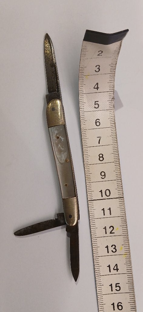 Vintage zakmesje, Ophalen