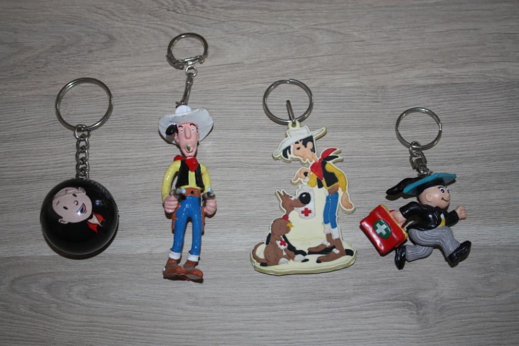 Lotje van 4 sleutelhangers  , Nero , Lucky Luke , Suske, Enlèvement ou Envoi, Autres personnages, Utilisé, Autres types