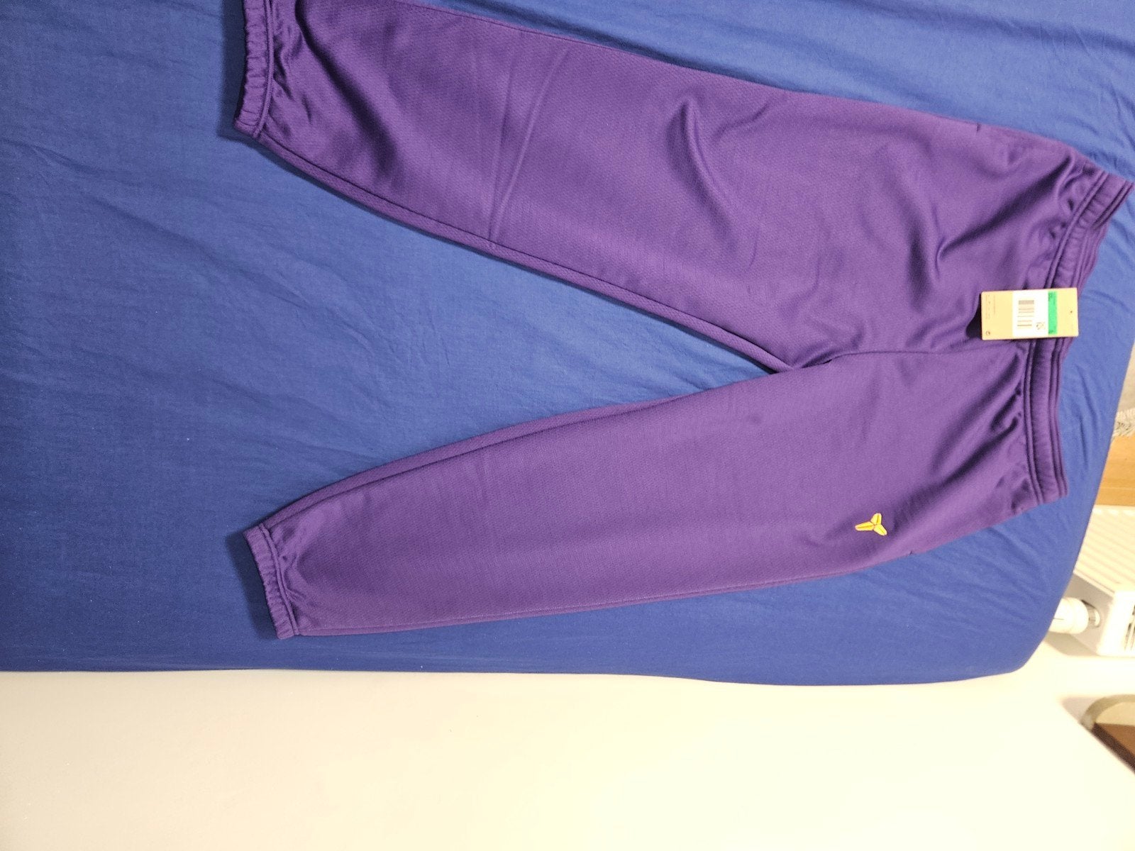 Kobe  trainingsbroek Nike, Ophalen