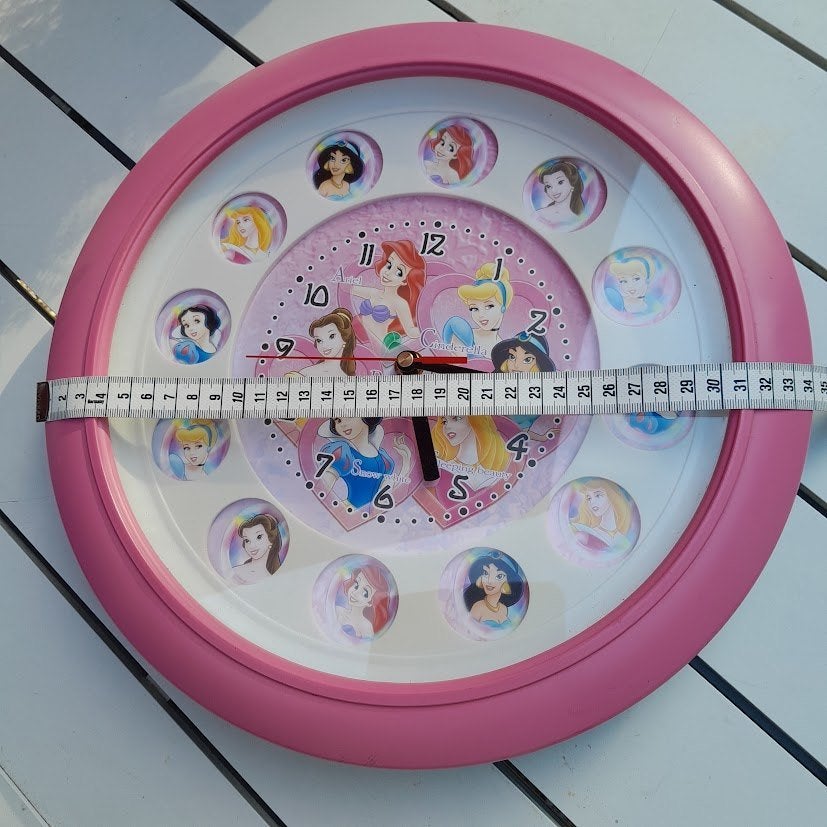Disney Princess wandklok. 34 diameter., Ophalen of Verzenden, Gebruikt, Overige typen