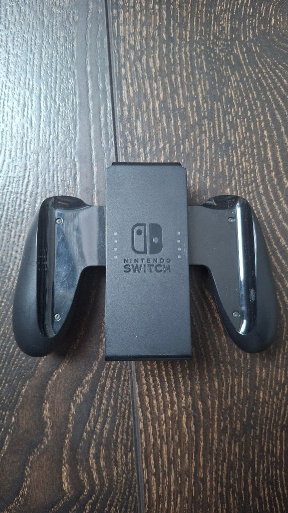 Originele Nintendo Switch Joy-Con Grip / houder, Games en Spelcomputers, Ophalen of Verzenden, Gebruikt