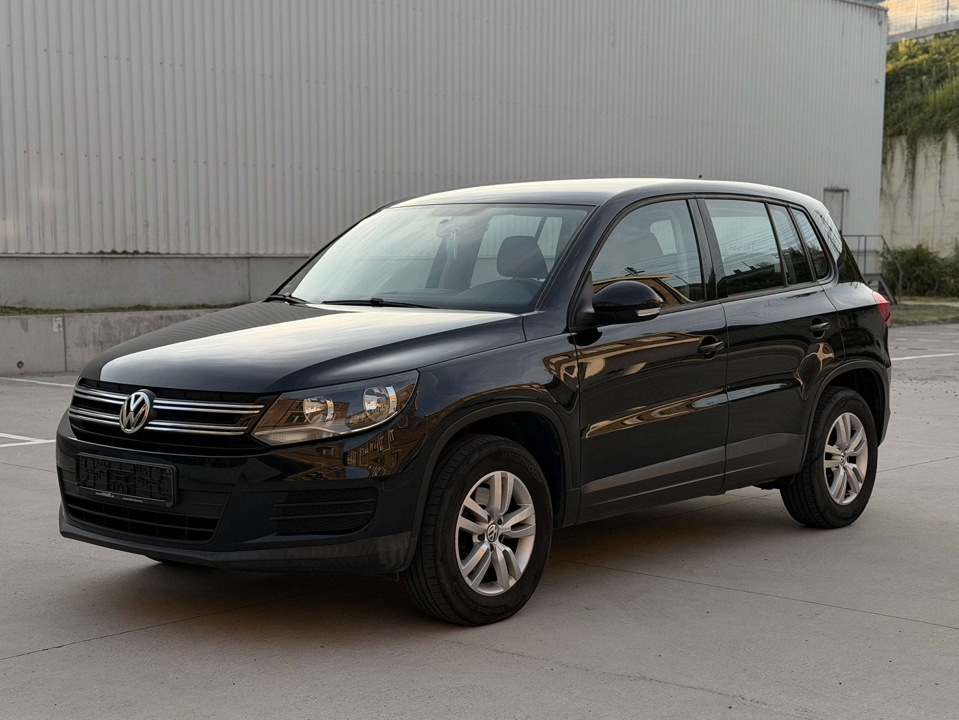 Volkswagen Tiguan 1.4 TSI • 4MOTION • CARPLAY • GARANT, Auto's, Euro 5, Stof, Gebruikt, Zwart