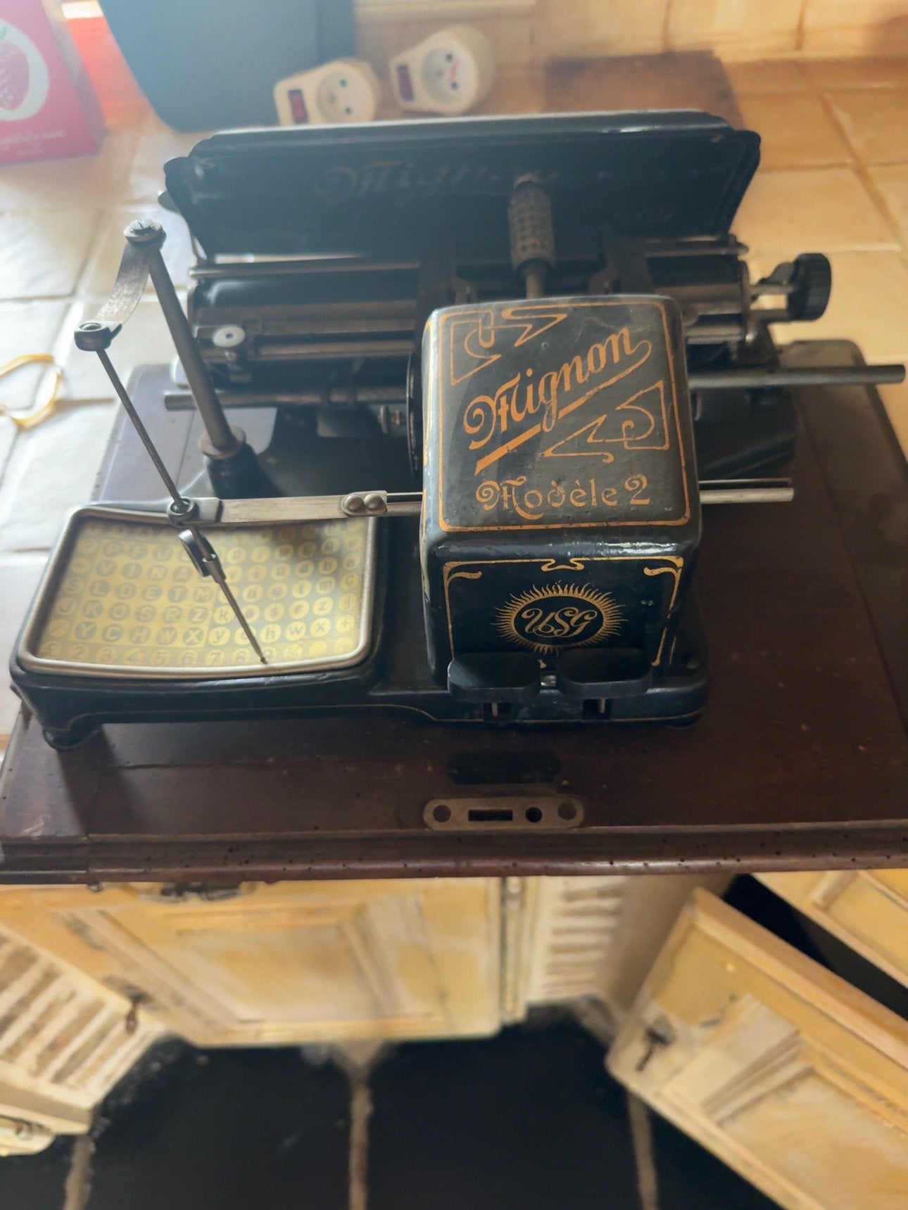 Antieke typmachine Mignon Modèle 2, Ophalen