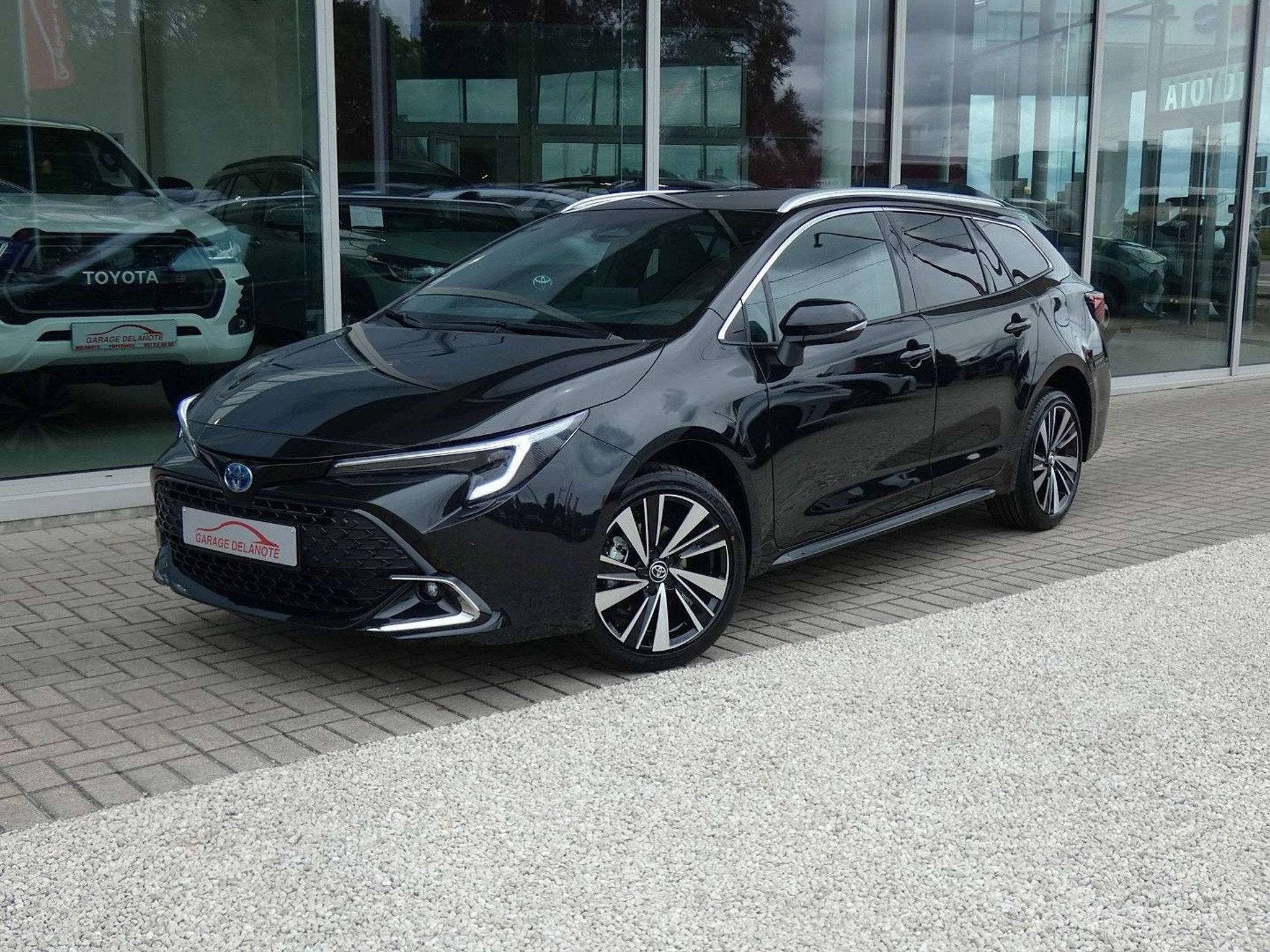 Toyota Corolla 1.8 Hybrid 140pk STYLE+WINTER PACK +Stuurwiel, Auto's, Zwart, 4 cilinders, Corolla, Parkeersensor