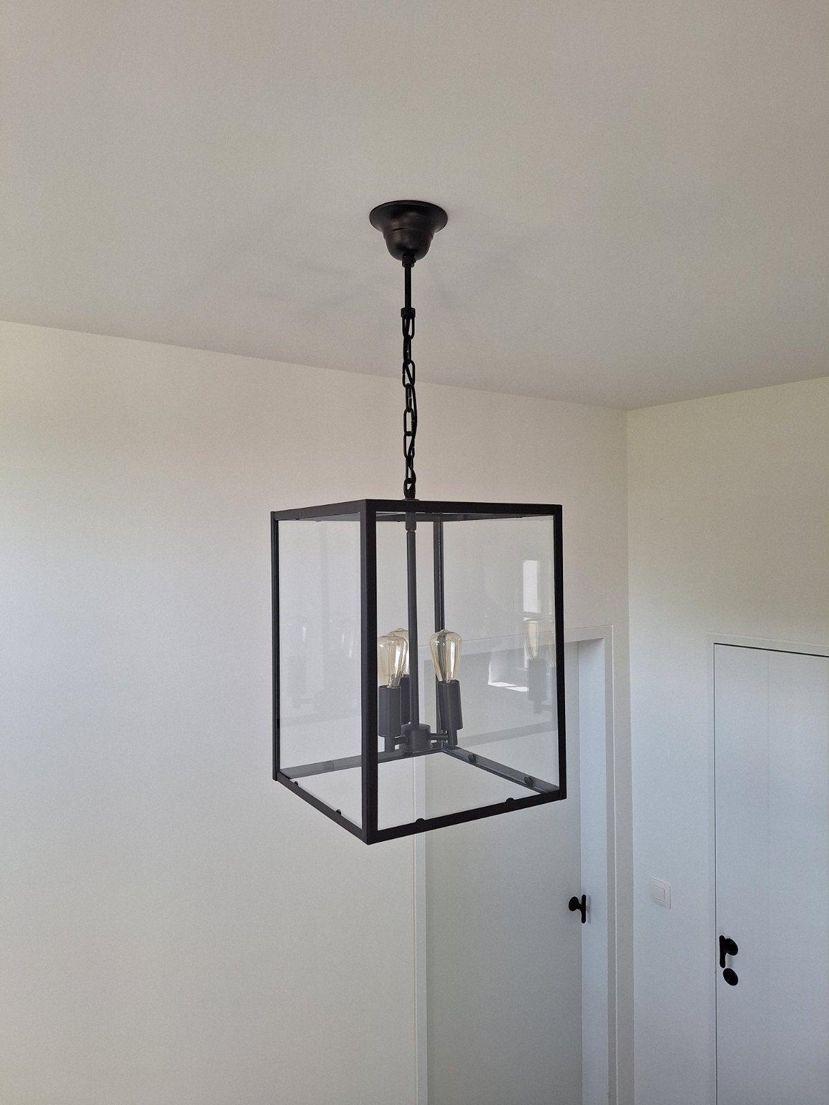 Hanglamp vervaardigd uit zwart metaal en glas., Ophalen
