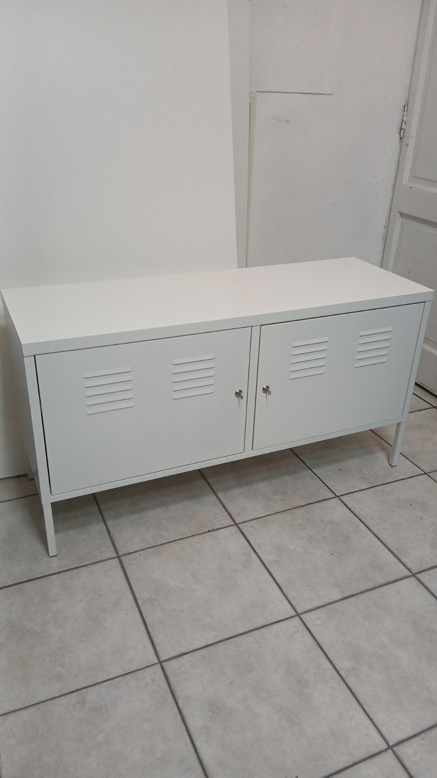 Witte IKEA PS-console, Ophalen