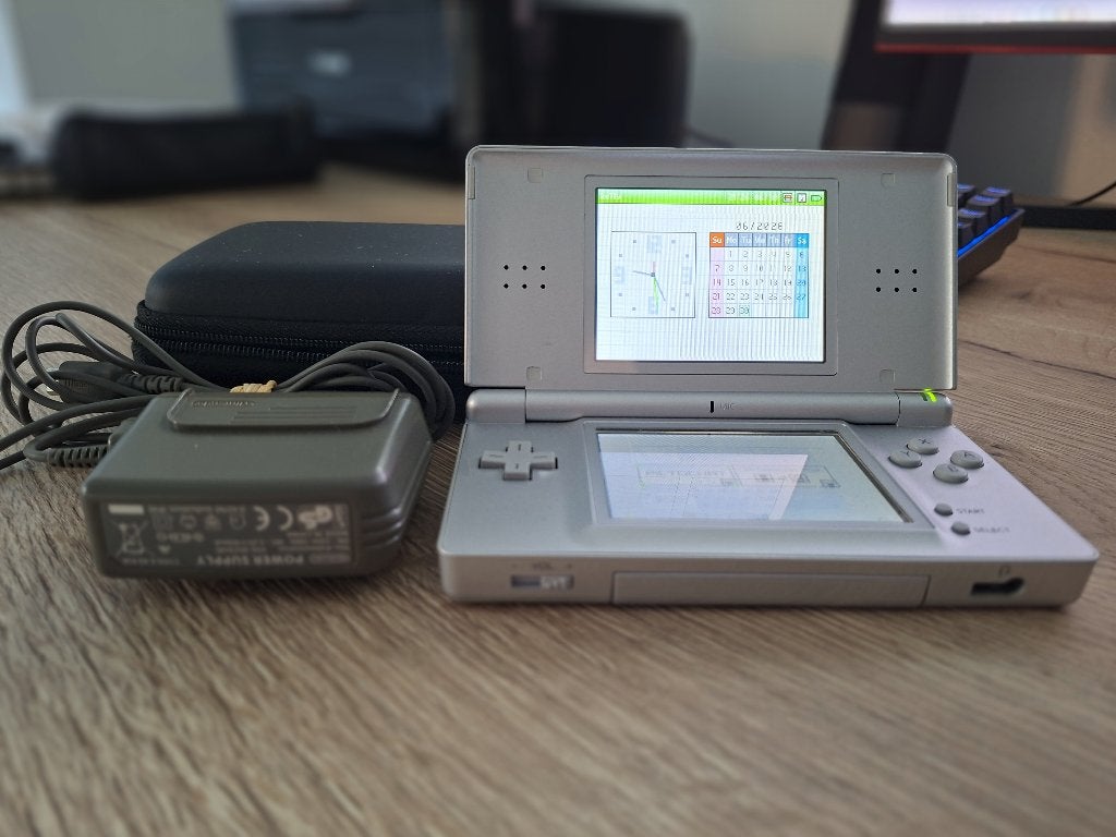 Nintendo DS Lite Zilver, Games en Spelcomputers, Spelcomputers | Nintendo DS, Gebruikt, Ophalen of Verzenden, DS Lite, Zilver