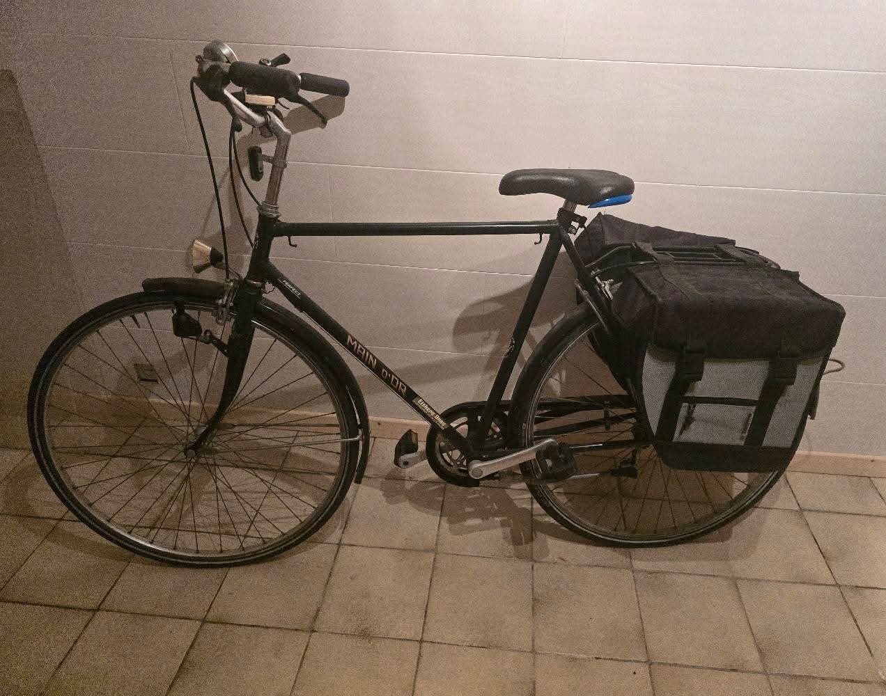 Klasieke degelijke herenfiets, Ophalen