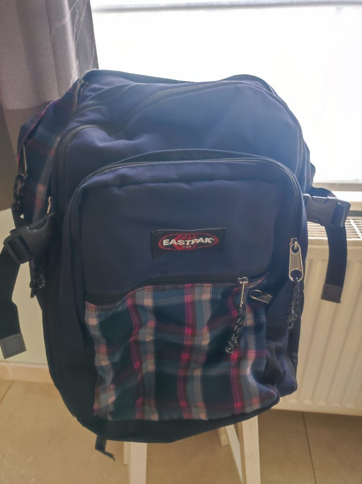 Eastpak boekentas / rugzak, Ophalen