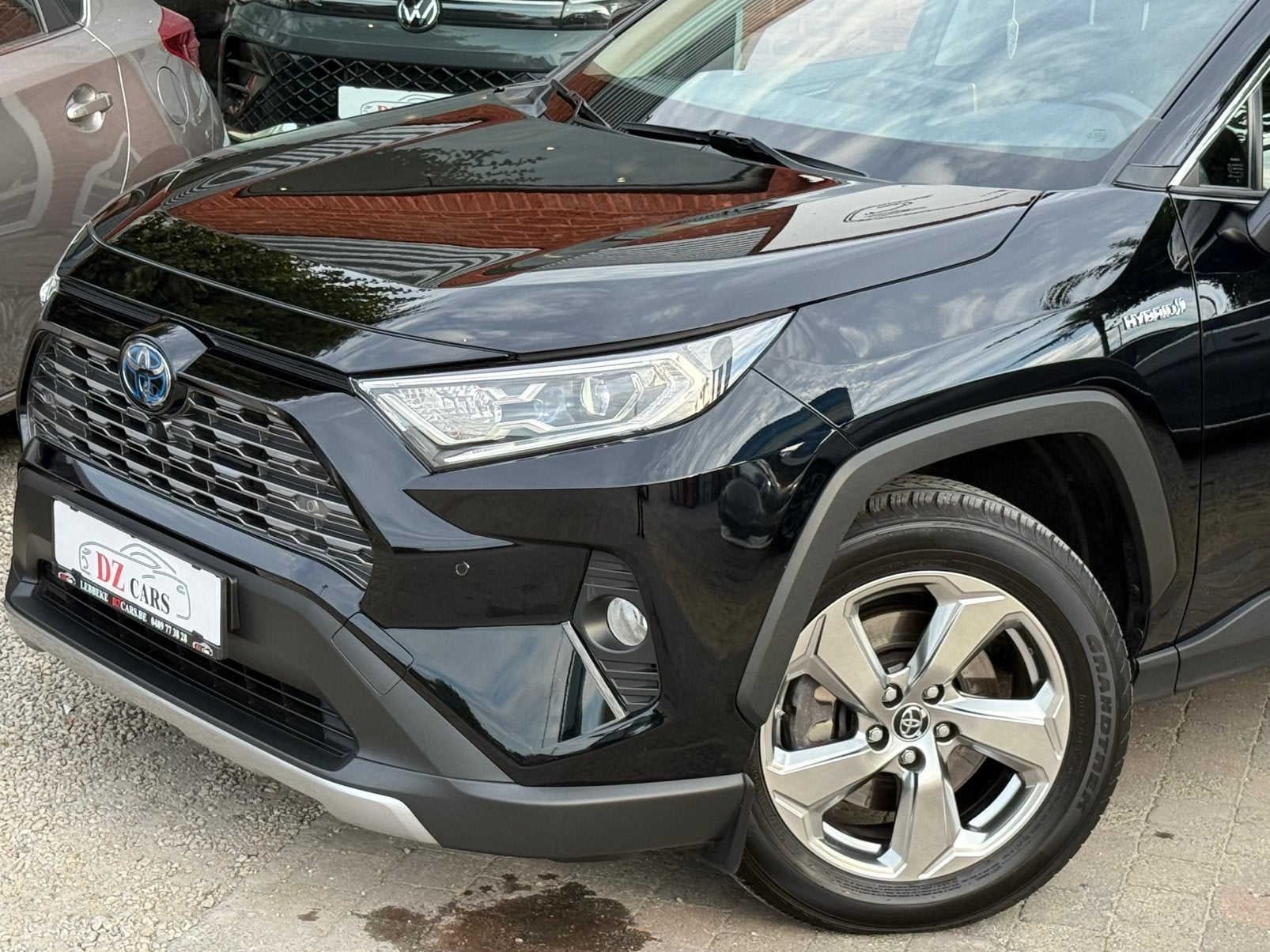TOYOTA RAV4 HYBRID 2.5I 181PK |NAVI | CAMERA 360* | ACC |, Auto's, Dealer onderhouden, 4 cilinders, 131 kW, Leder