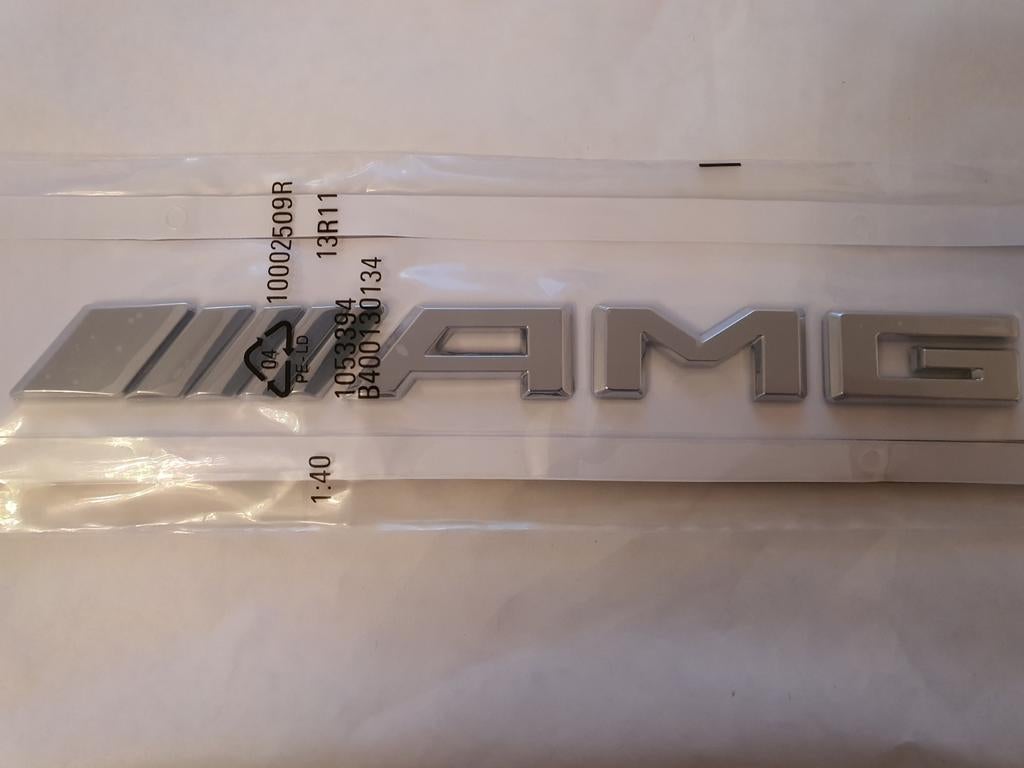 Mercedes Amg koffer logo in chroom of zwart, Auto-onderdelen, Achterklep, Mercedes-Benz, Nieuw, Ophalen of Verzenden