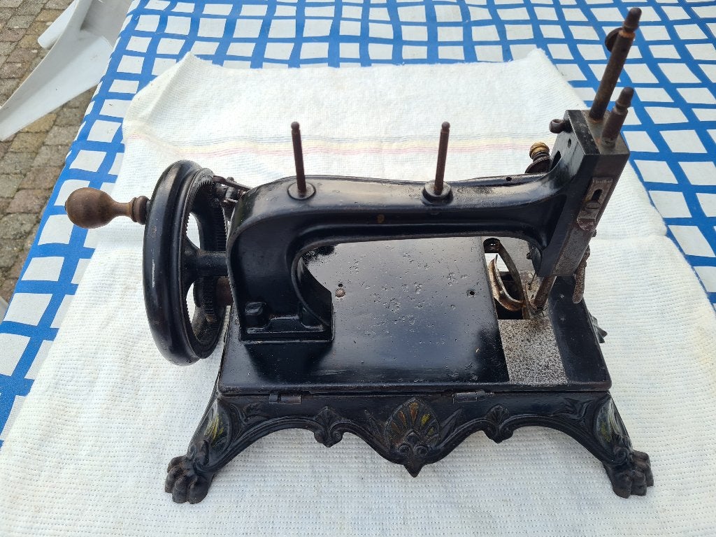 antieke naaimachine, Ophalen