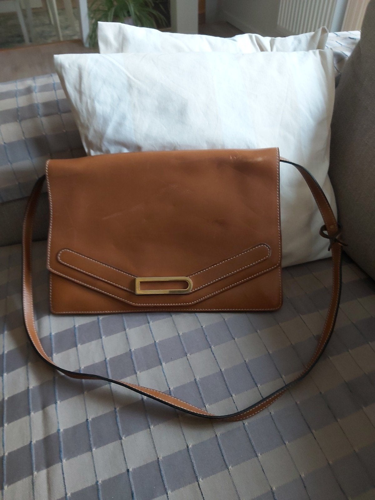 Handtas Delvaux Léonce crossbody, Ophalen