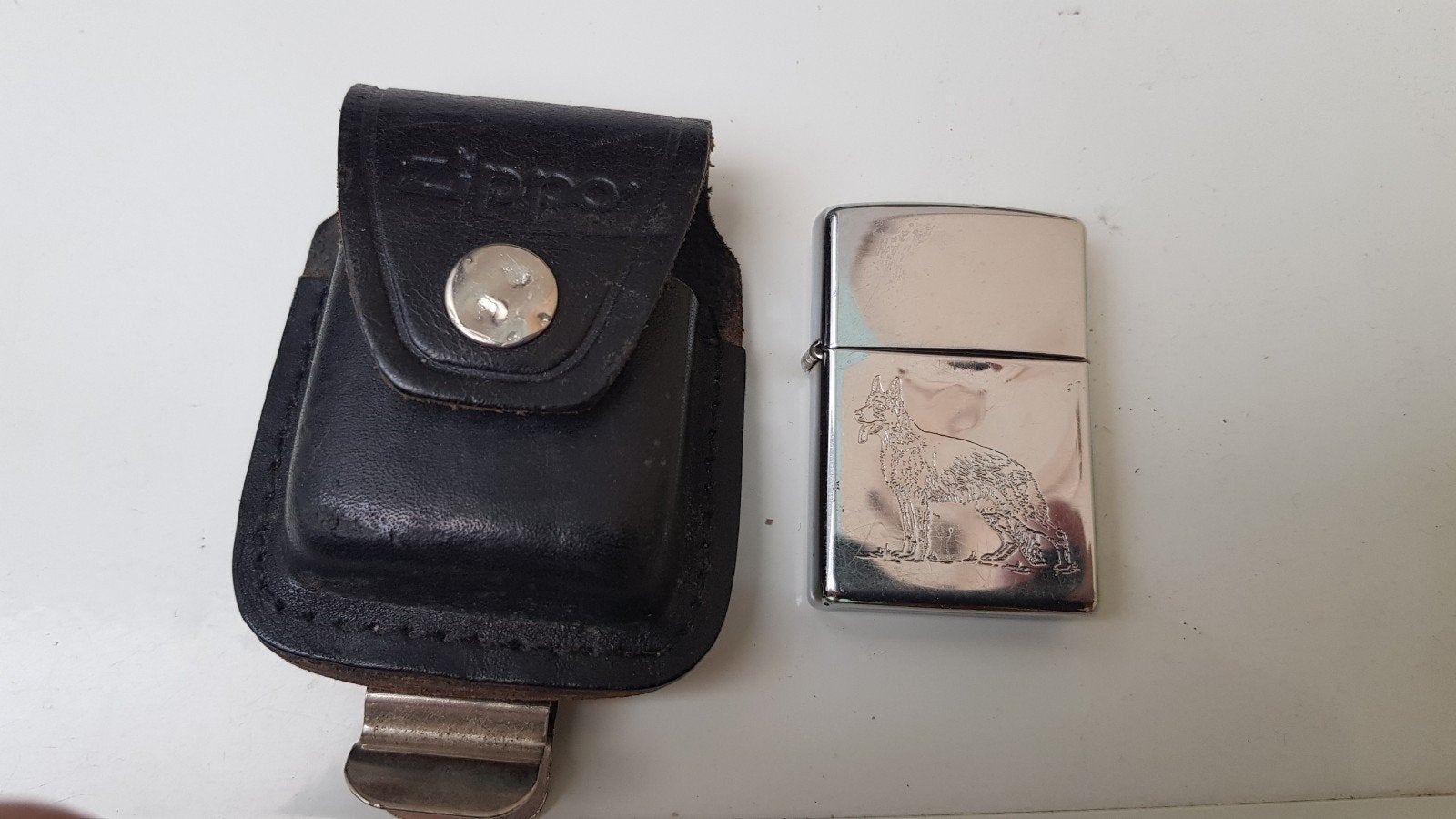 Zippo gasaansteker en Zippo-riemhouder, Verzamelen, Rookartikelen, Aanstekers en Luciferdoosjes, Ophalen of Verzenden, Gebruikt