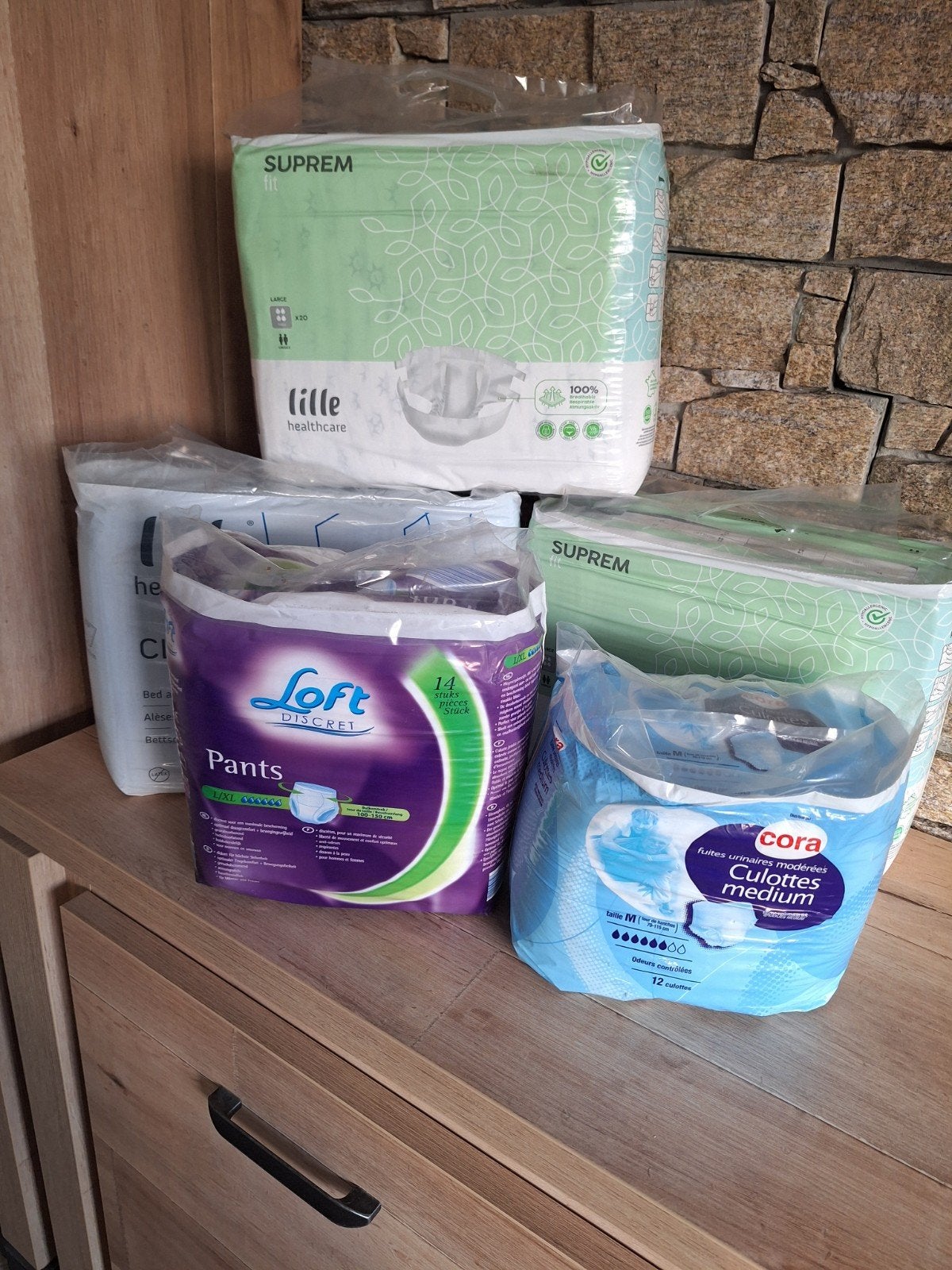 Lot de 7 paquets protections incontinence + alèses (Lille He, Diversen, Ophalen, Nieuw