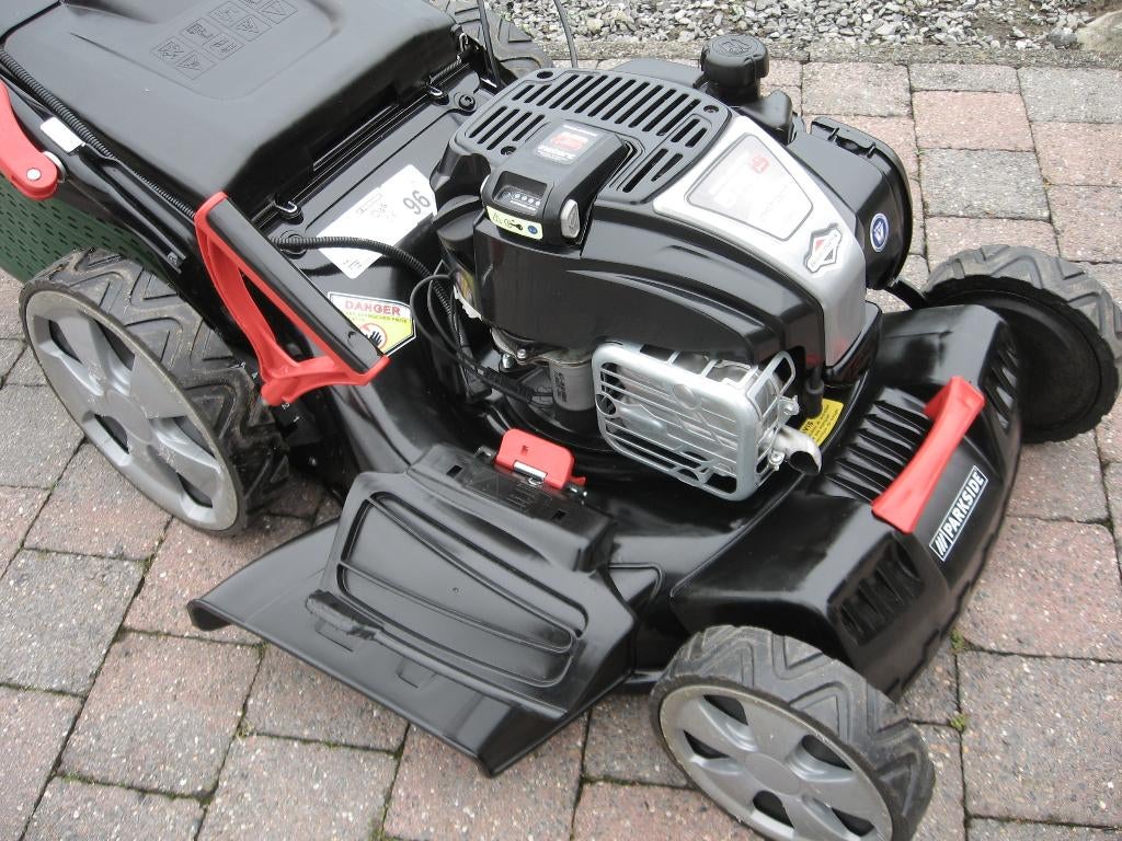Tondeuse tractée avec démarreur électrique , moteur B&S 575, Tuin en Terras, Grasmaaiers, Zo goed als nieuw, Benzine-grasmaaier