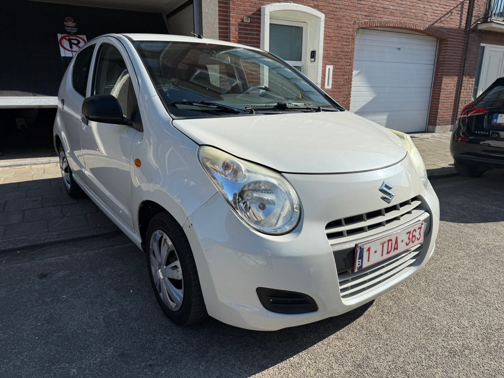 Suzuki alto 1.0benzine 2011 59.704km, Auto's, Voorwielaandrijving, Euro 5, Stof, Zwart
