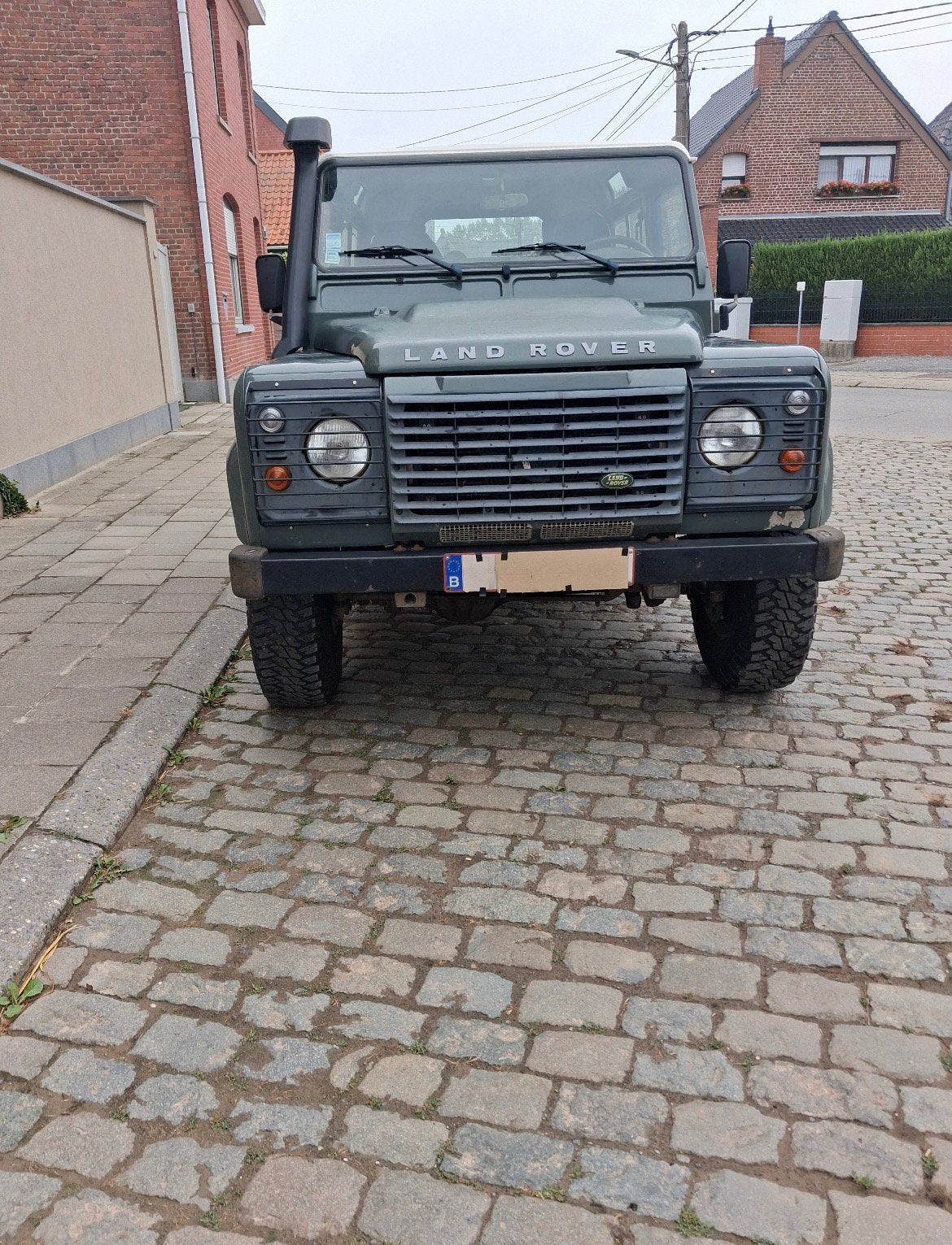 Land Rover Defender 2.4 Turbo 90, Auto's, Land Rover, Stof, Defender, Particulier, 2 zetels