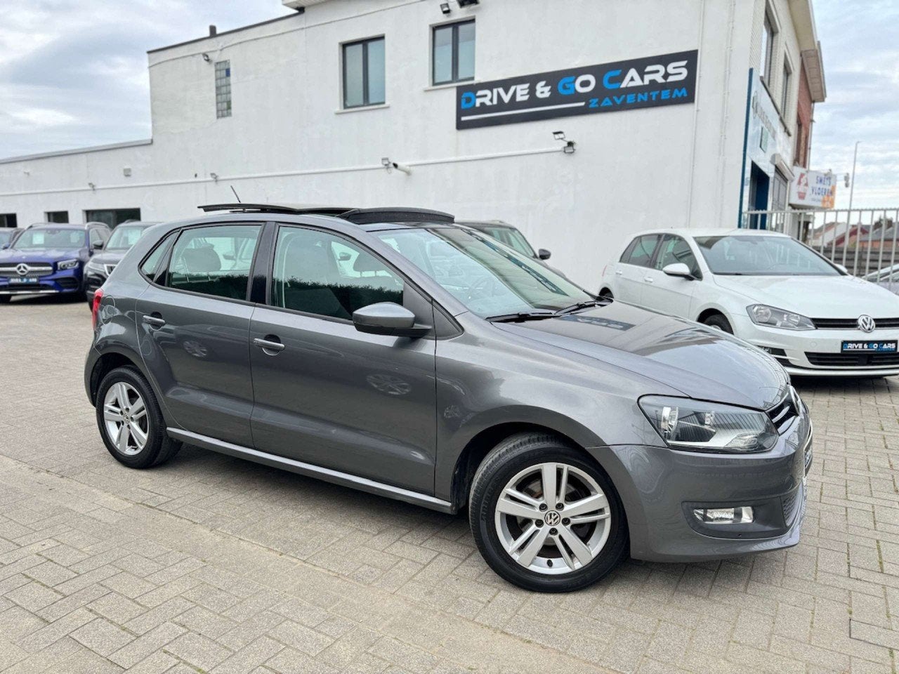 Volkswagen Polo 1.2i Highline - CarPlay * 1 JAAR GARANTIE *, Auto's, Voorwielaandrijving, Stof, Gebruikt, Zwart