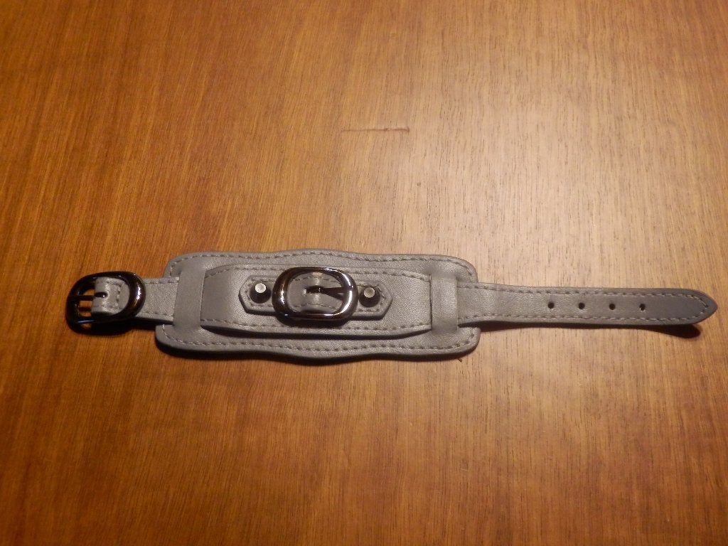 (10) -bracelet gris en cuir = neuf =, Handtassen en Accessoires, Ophalen of Verzenden, Nieuw, Grijs, Leer