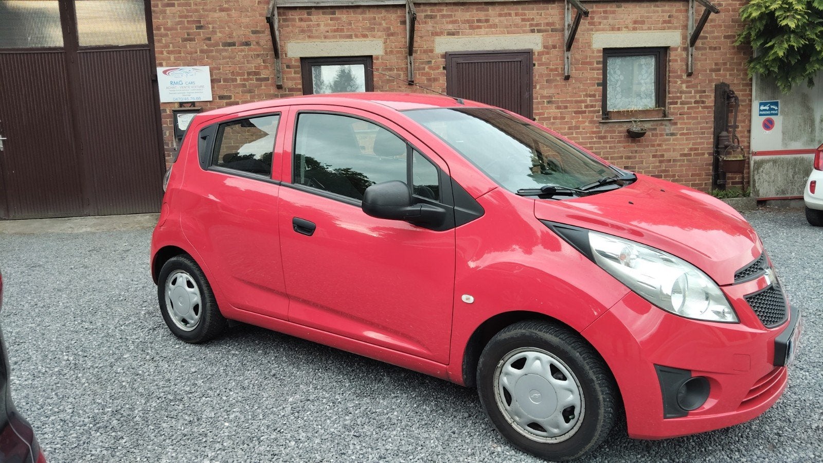 Chevrolet spark 1.0 essence, 2012, 135000km carnet complet, Auto's, Chevrolet, Voorwielaandrijving, Euro 5, Stof, Zwart
