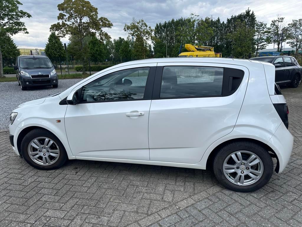 Chevrolet Aveo 1.2i Essence Euro5, Auto's, Chevrolet, Voorwielaandrijving, Euro 5, Stof, 1229 cc
