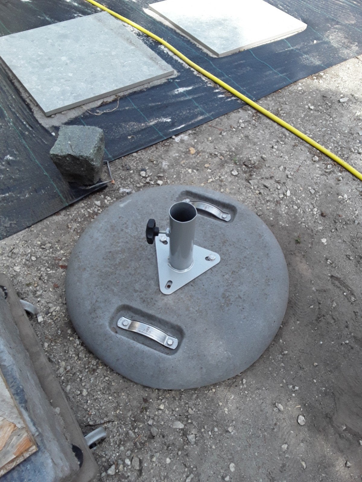 betonnen parapluvoet, Ophalen