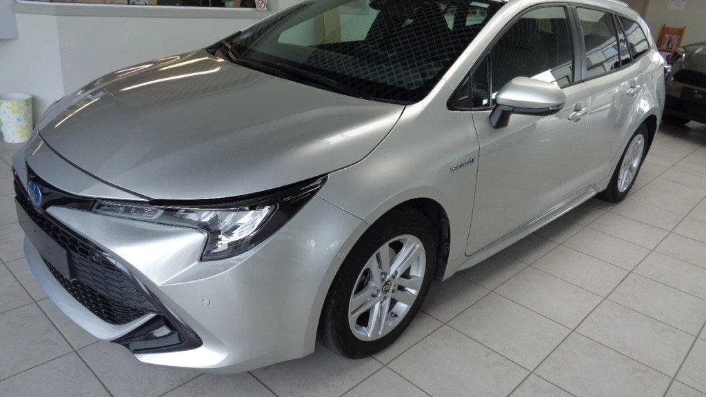 Toyota Corolla TOURING BUISINESS LINE (bj 2019, automaat), Auto's, Automaat, Stof, Gebruikt, 4 cilinders