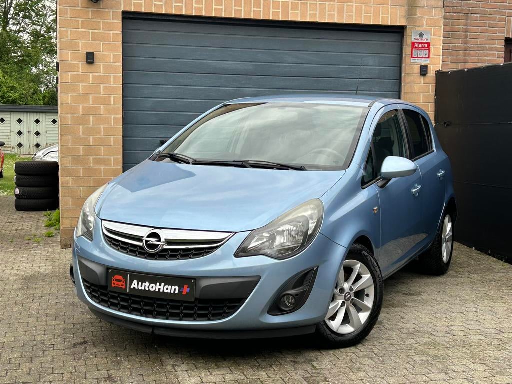 Opel Corsa 1.2 Edition Airco Navigatie Cruise Onderhoudsboek, Auto's, Voorwielaandrijving, Euro 5, 4 cilinders, Blauw