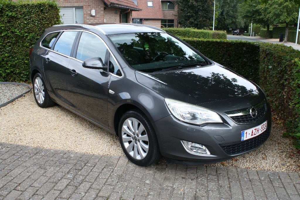 Opel astra break 1600cc, Auto's, Euro 5, Zwart, 4 cilinders, Leder en Stof