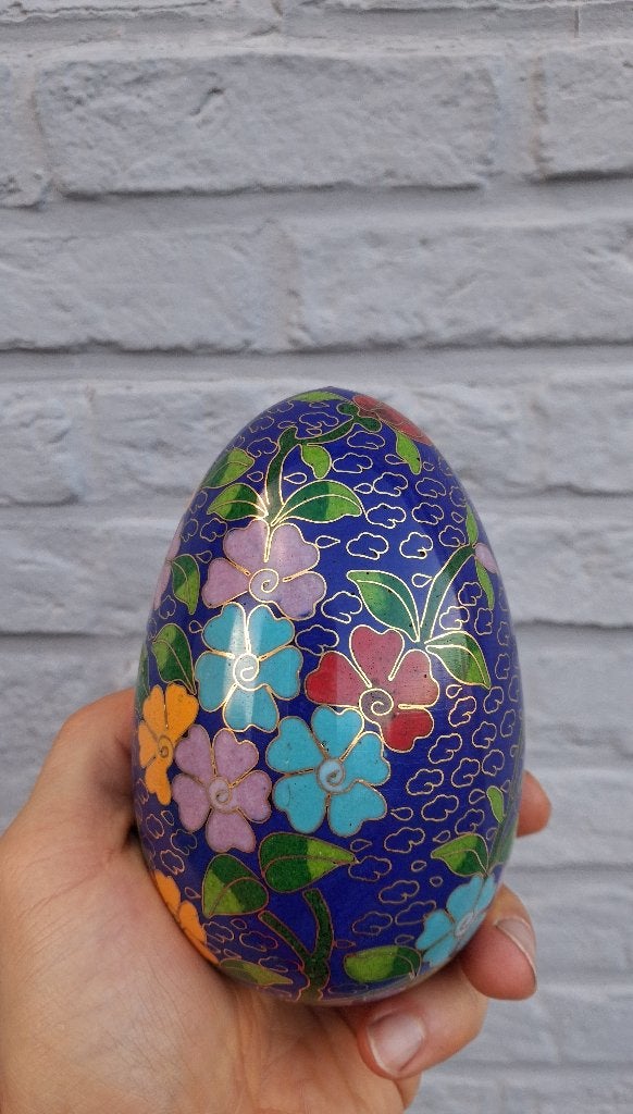cloisonne ei, Ophalen