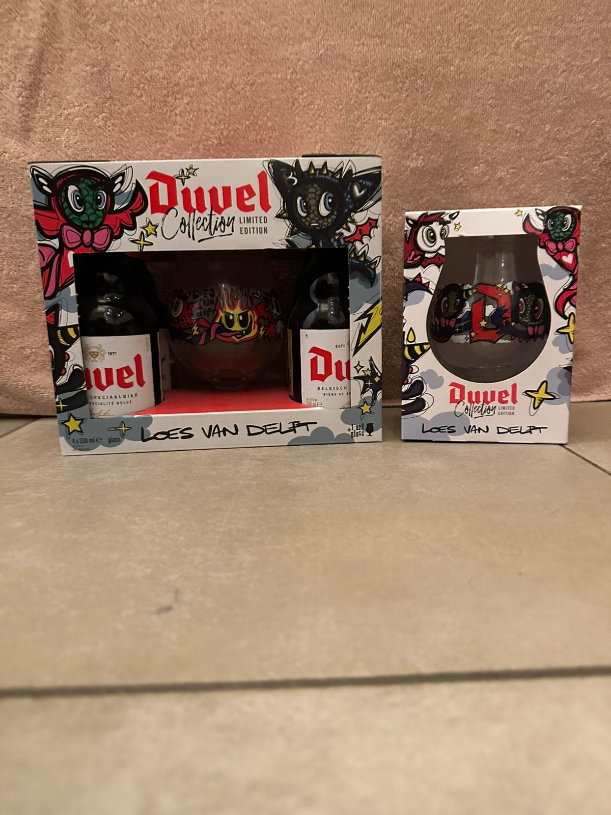 Duvel glas in doos en duvel box loes van delft, Ophalen of Verzenden, Nieuw, Glas of Glazen, Duvel