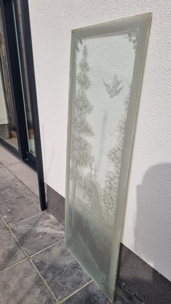 Gegraveerd glasraam, Ophalen