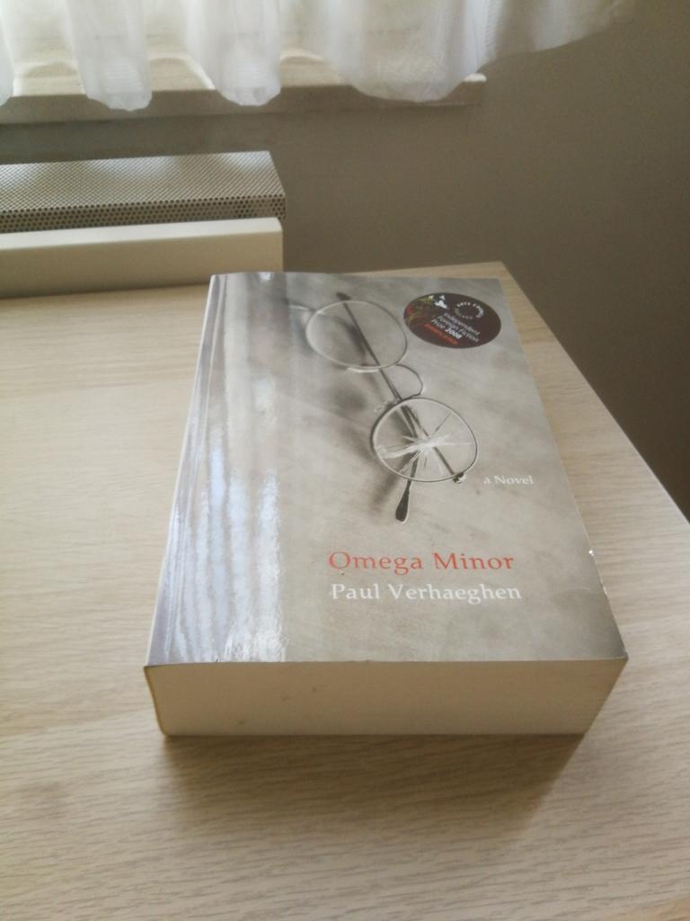 Paul Verhaeghen - Omega Minor - Engels, Ophalen of Verzenden, Zo goed als nieuw