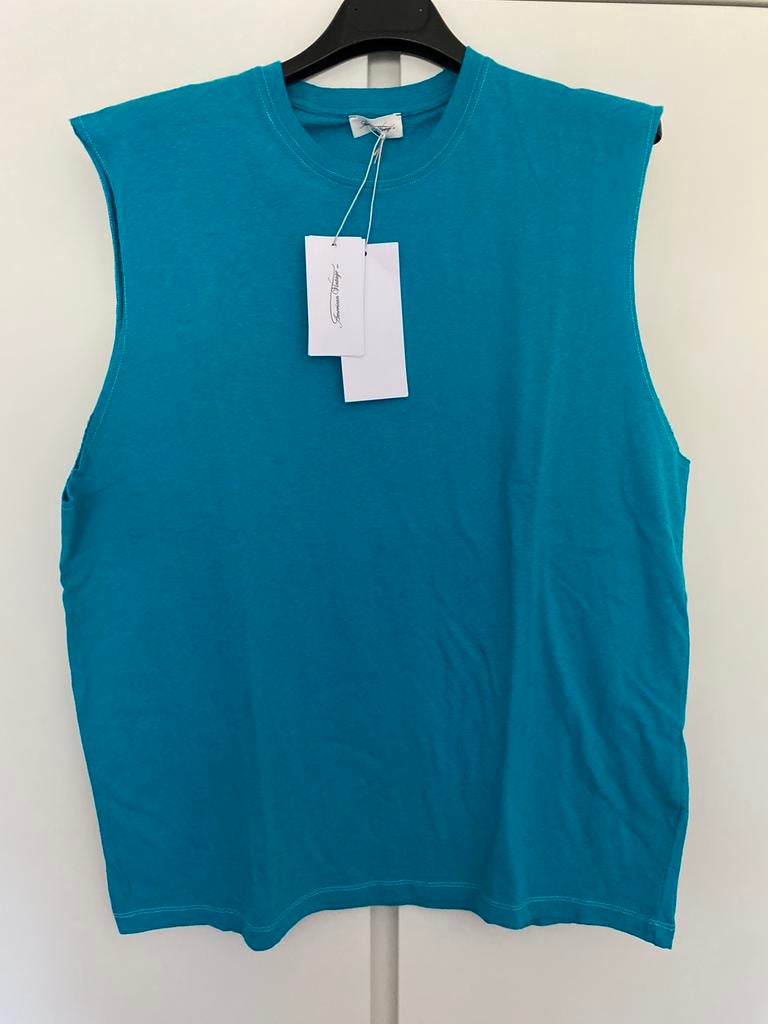American vintage - Turquoise bloesje. Maat S. Nieuw, Enlèvement ou Envoi, American vintage, Taille 36 (S), Bleu