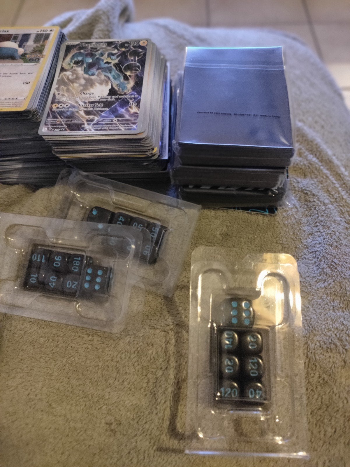 lot Pokemon kaarten + extra's, Ophalen of Verzenden, Zo goed als nieuw, Meerdere kaarten, Foil