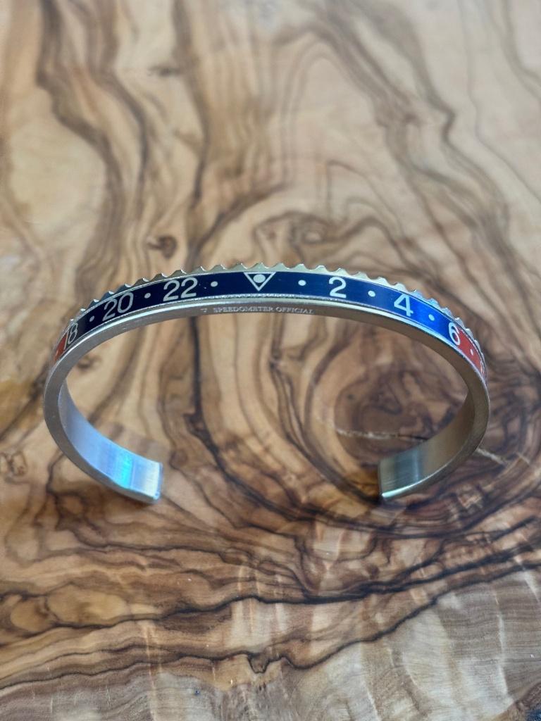 Rolex-Speedometer Official bracelet, Handtassen en Accessoires, Armbanden, Ophalen, Zo goed als nieuw, Rood, Staal