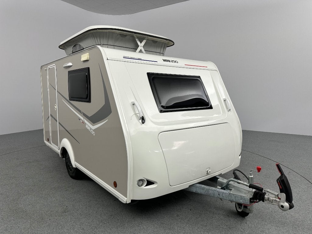 Trigano Silver Mini Freestyle 290 Mover, Caravans en Kamperen, Trigano, Voortentlamp, Tot en met 2, Bedrijf