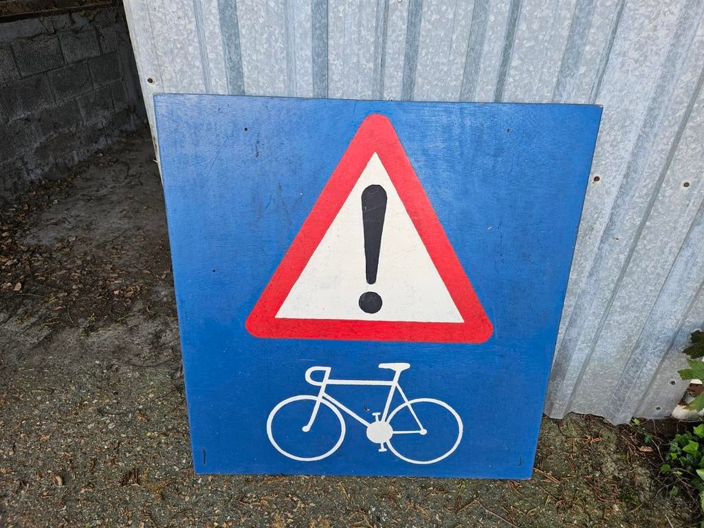 Plakaat voor wielrennen in hout, Ophalen