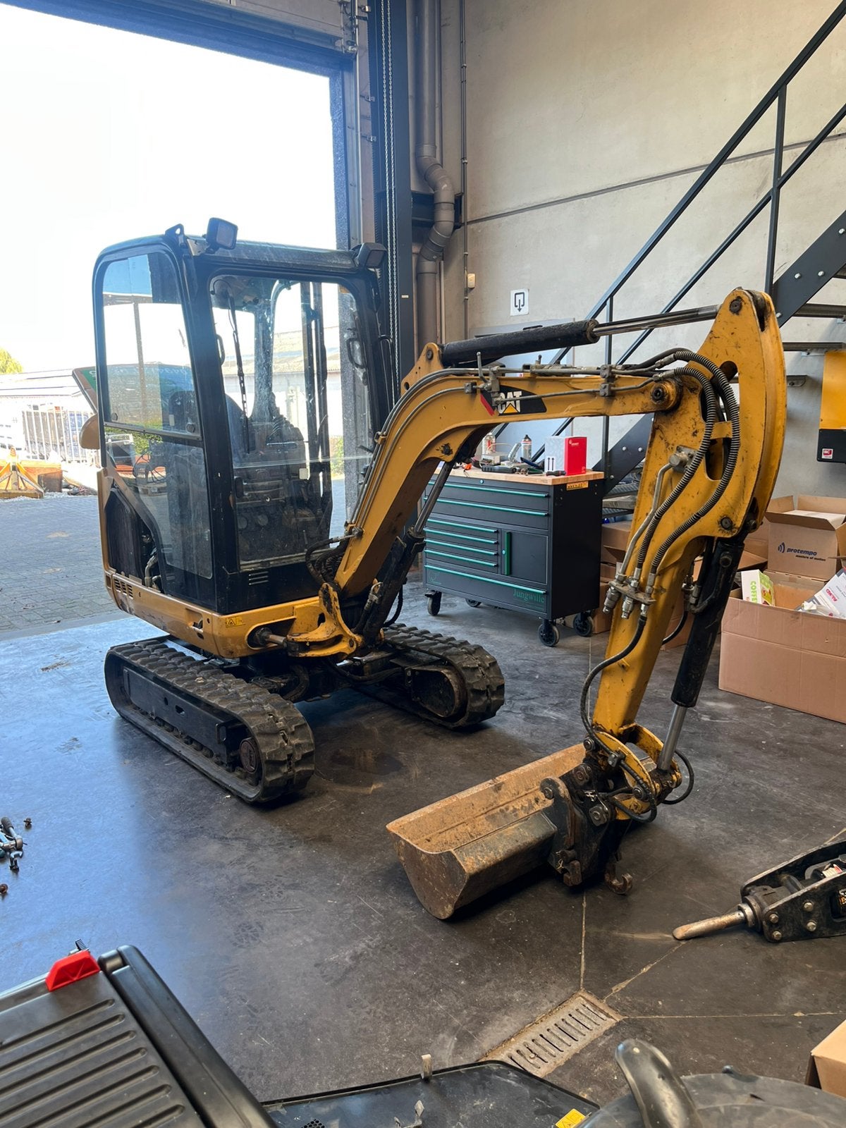 Cat 1.7D, Zakelijke goederen, Ophalen, Graafmachine